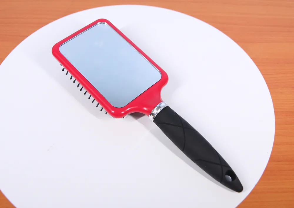 Compact Mirror With Comb