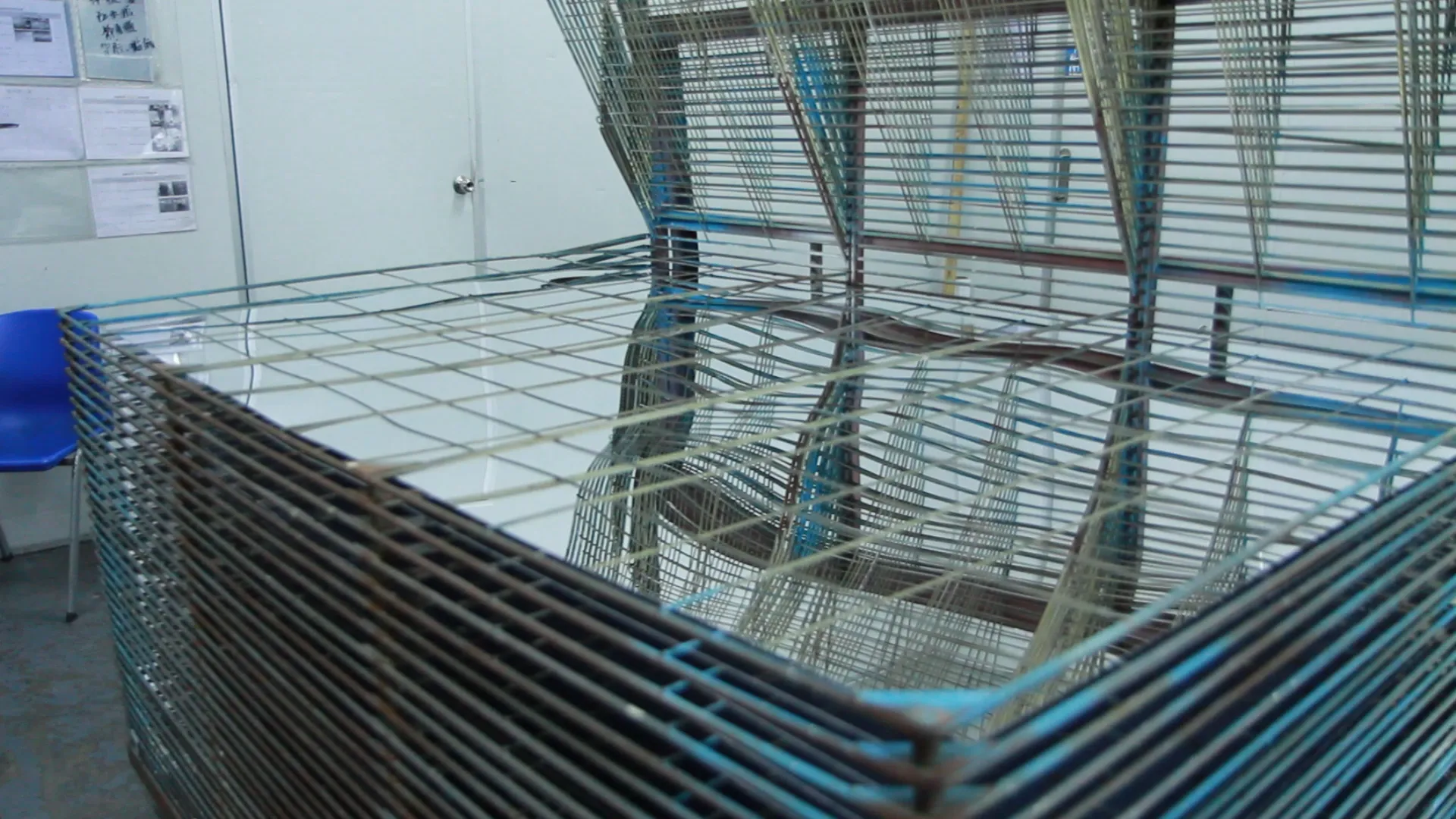 Place the mirror panel on the multi-tiered shelf video cover