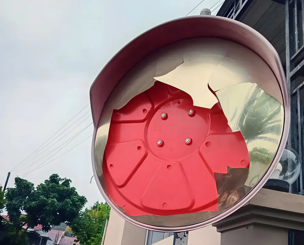 A shattered traffic mirror