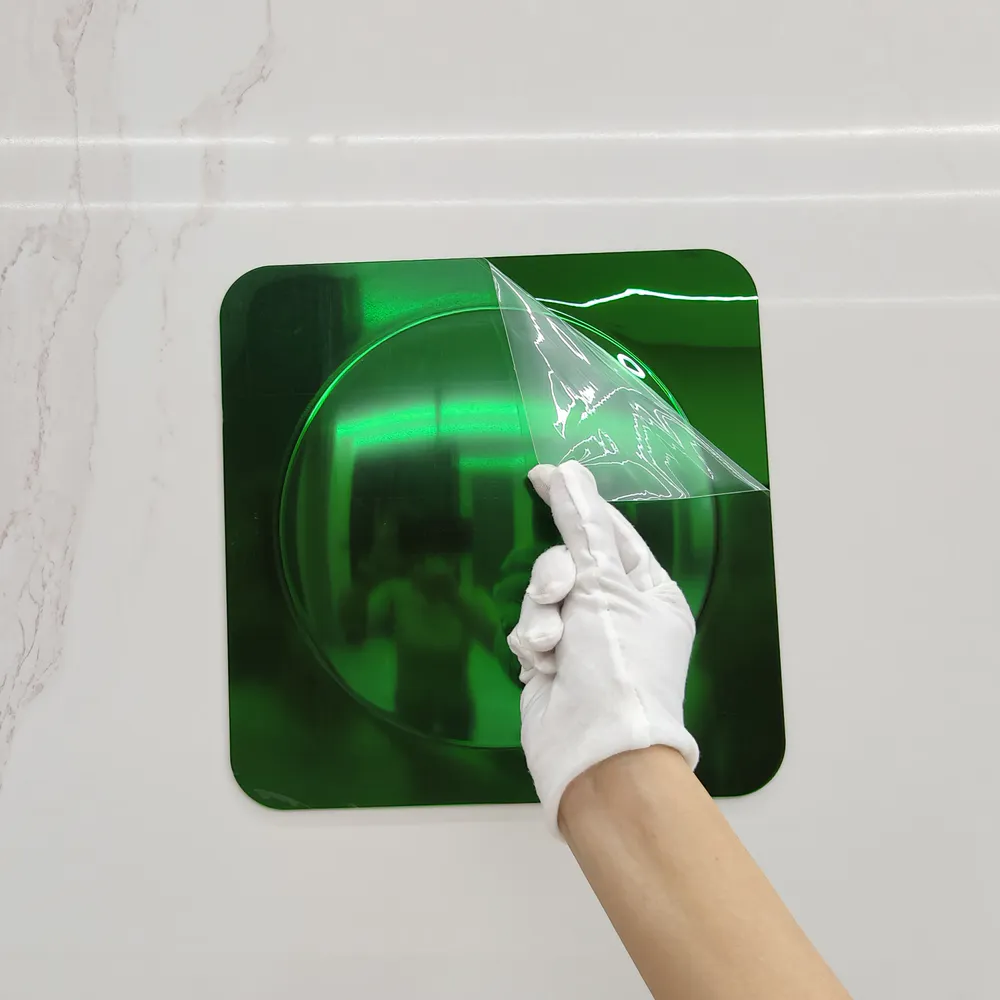 Image of a green single bubble mirror with the protective film torn open
