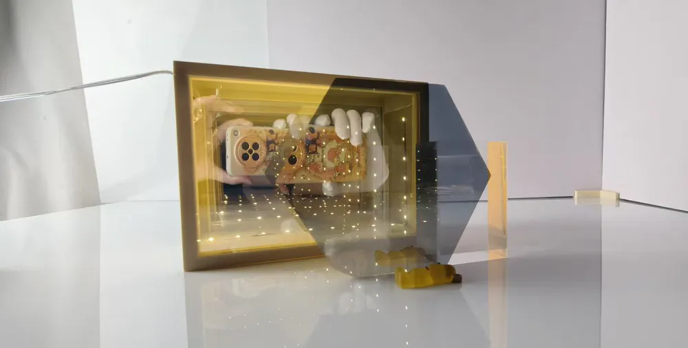 a two-way mirror in front of the multi-layer mirror