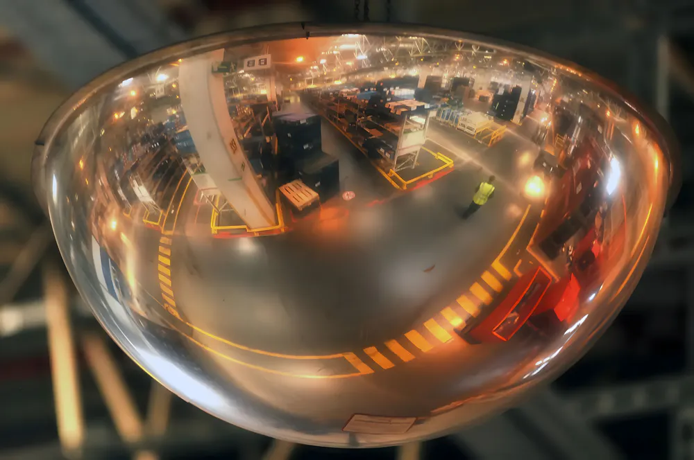 Acrylic dome mirror hanging above the factory