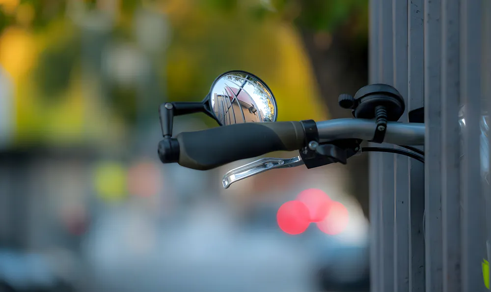Bicycle and motorcycle helmet mirrors