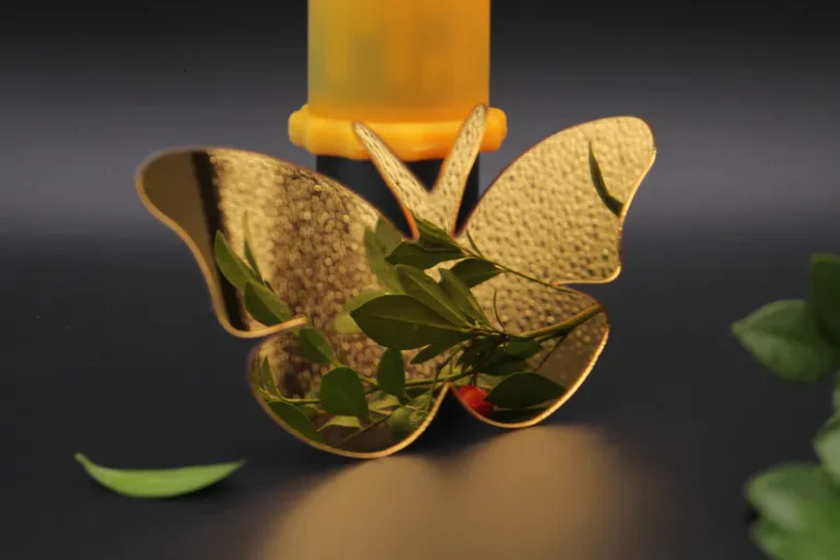 Butterfly‑shaped golden acrylic mirror