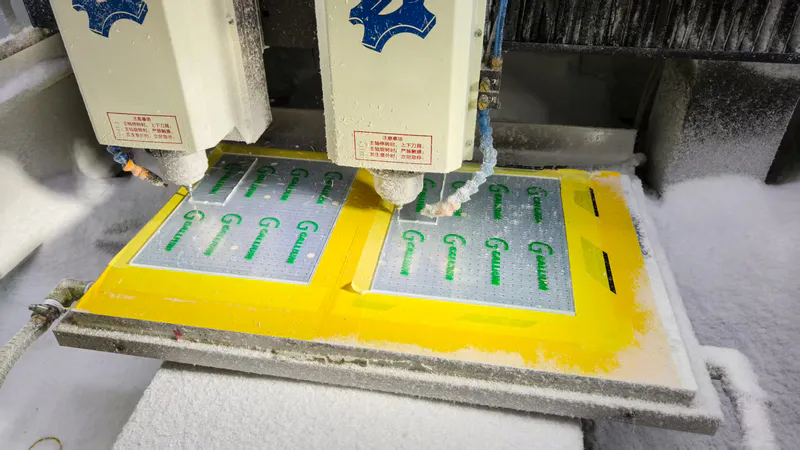 CNC numerical control is cutting a transparent acrylic board