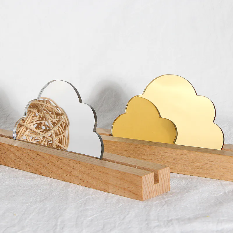 Cloud‑shaped acrylic mirrors, in silver and gold