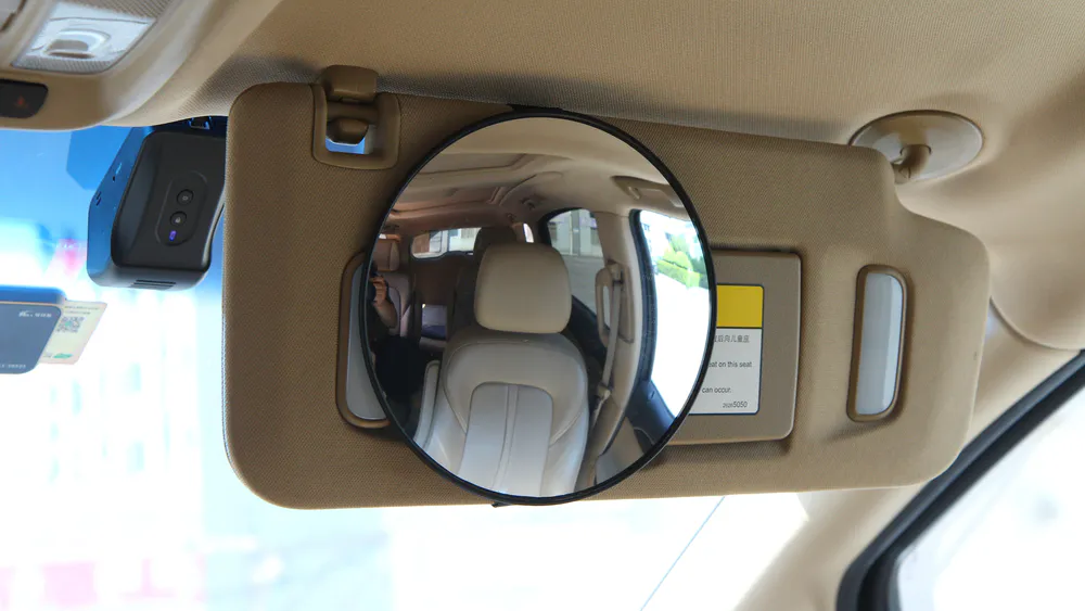 Convex mirror installed on the sun visor
