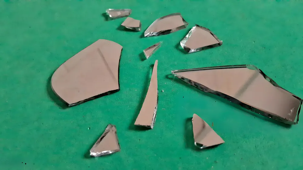 Fragments of the shattered mirror