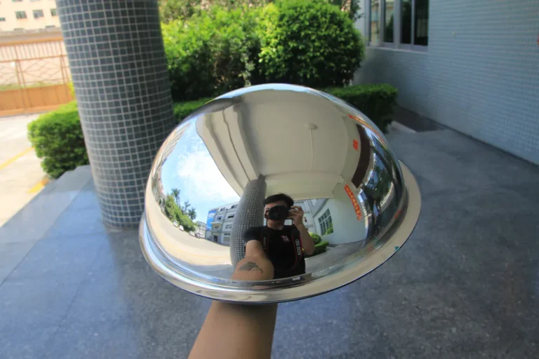 Holding a dome mirror while photographing