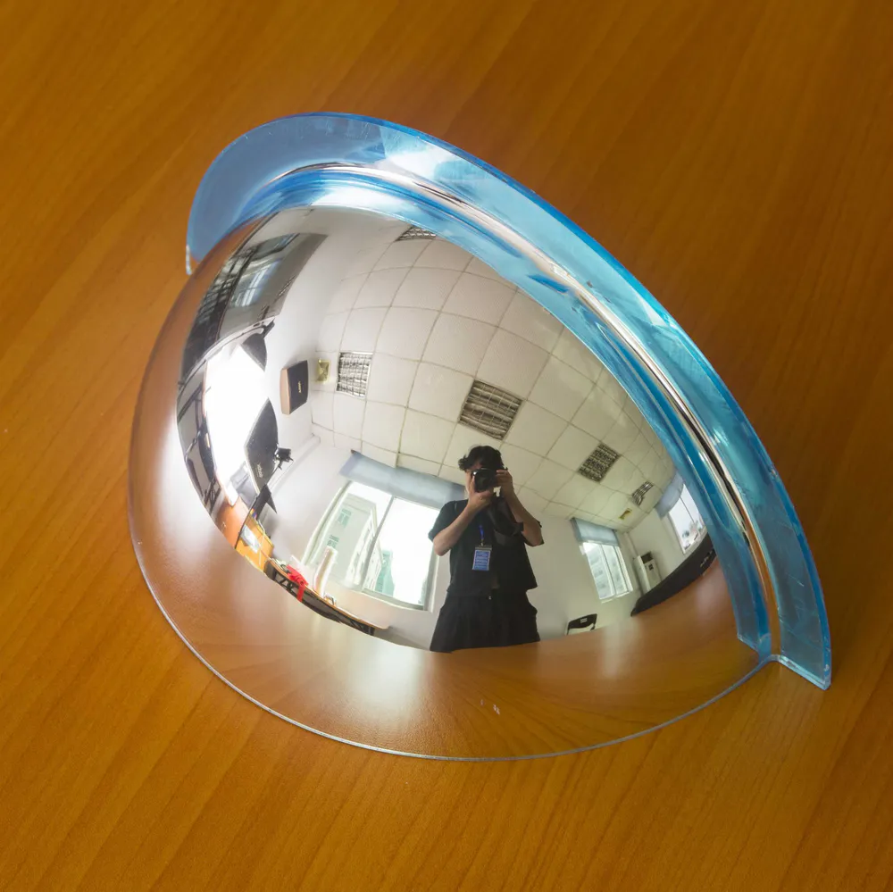 The hemispherical dome mirror on the table