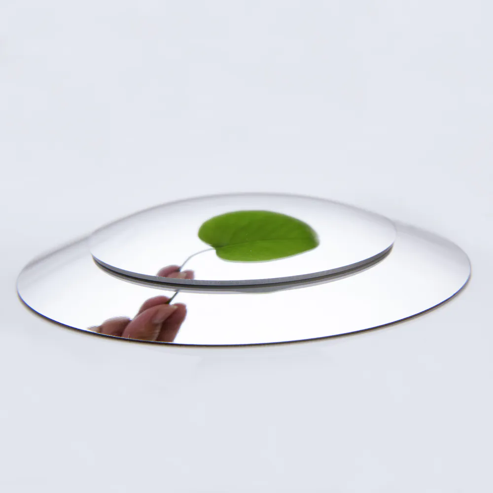 Two acrylic convex mirrors with different thicknesses