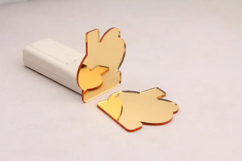 Laser‑cut mirror part of unknown shape