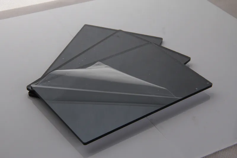 Three black and gray acrylic mirrors