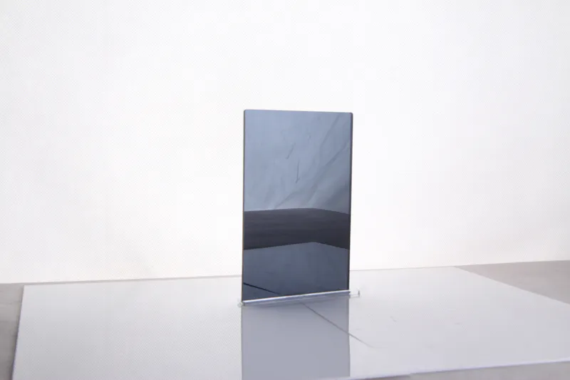 A small black acrylic mirror sample