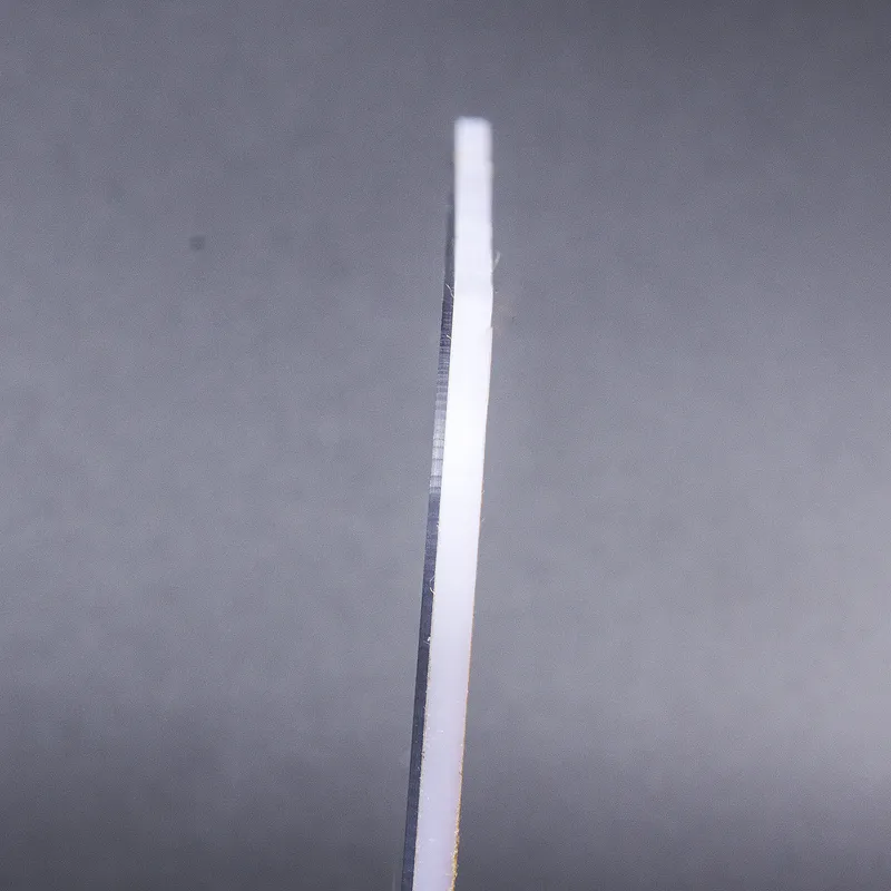 The edges of the silver acrylic mirror have a kind of plastic feel