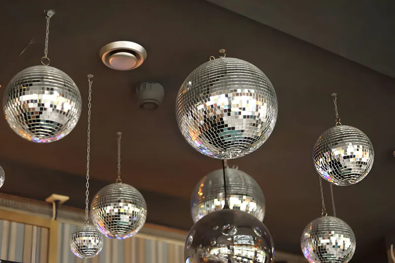 Mirrored disco ball hanging from the ceiling