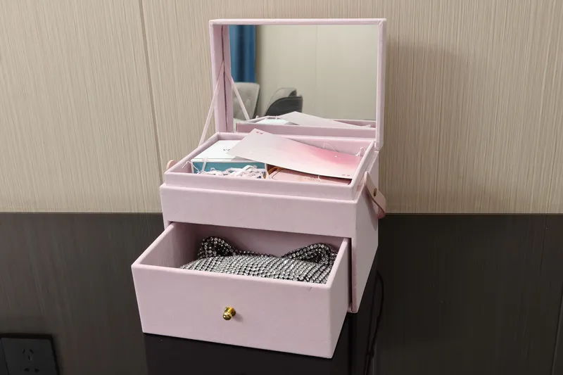 A mirror is embedded inside the makeup case