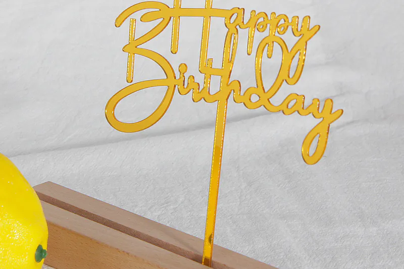 Cake topper made from cut acrylic mirror pieces