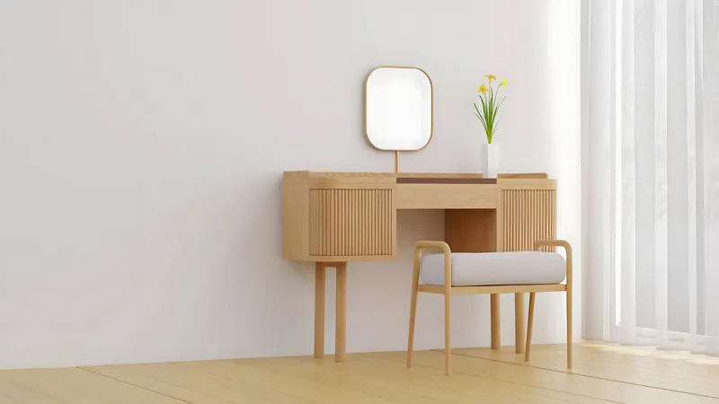 Dressing mirror table leaning against the wall