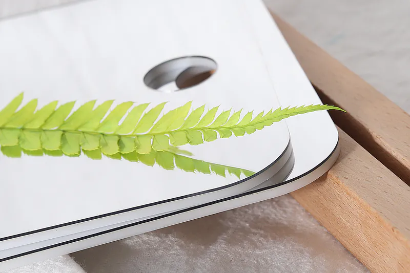 Acrylic anti-fog mirror using a lamination process