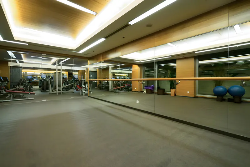 The full-length mirror inside the gym