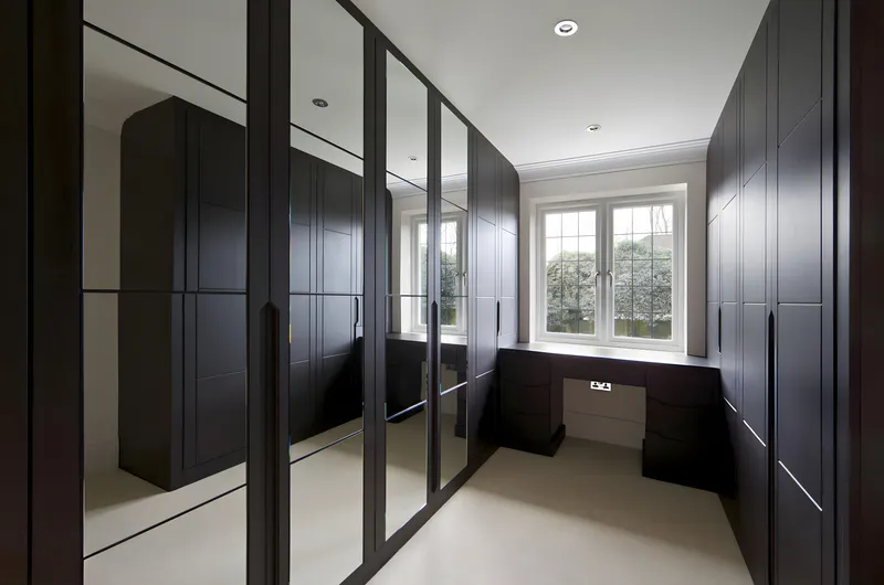 Wardrobe door with built-in mirror